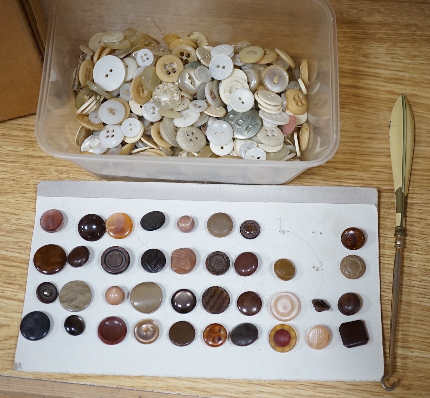 A vintage top hat and tails, collars, pincenez, cumberbunds, bow ties, a collection of seamstress buttons etc